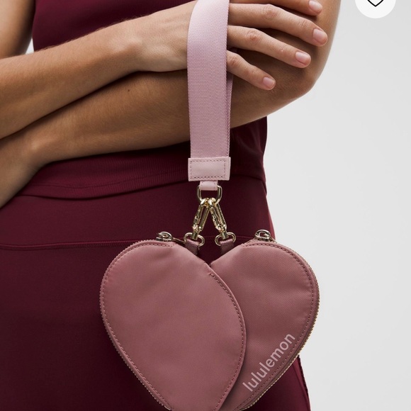 lululemon athletica Handbags - lululemon athletica Heart-Shaped Pink Wristlet